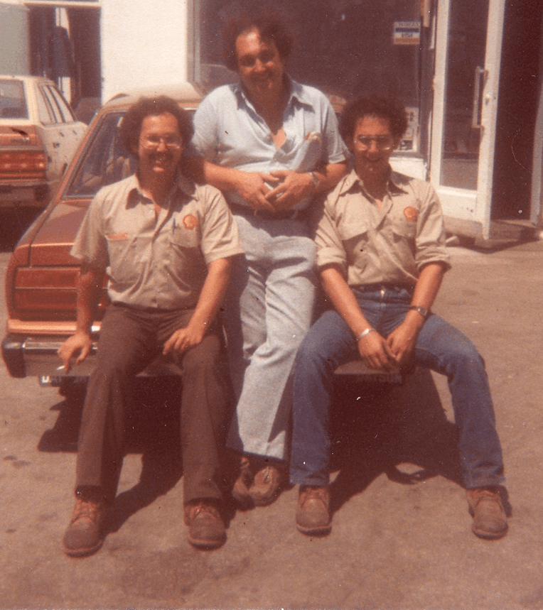 That's me on the left (Lawrence Fox, accountant for Canadian freelancers), my Dad (in the middle) and my brother. Three hairy guys hanging out at the gas station.